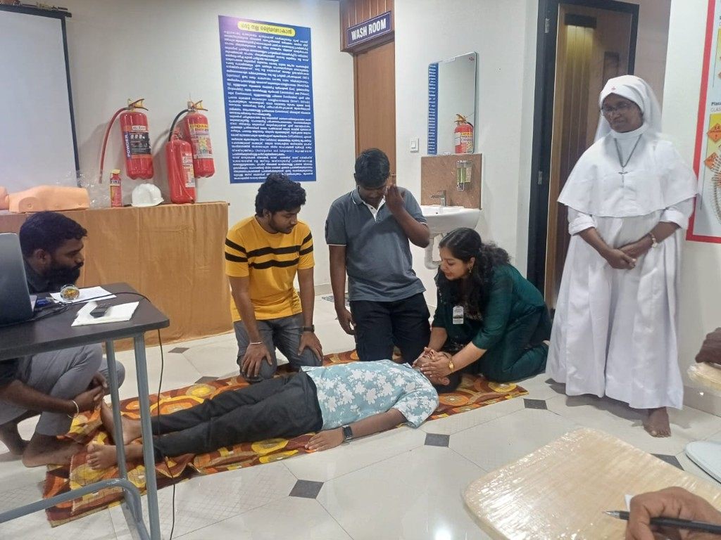 First-aid session with fire extinguishers and hazard safety posters